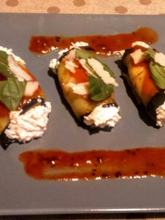 Una foto de Berenjenas rellenas de queso ricota y parmesano