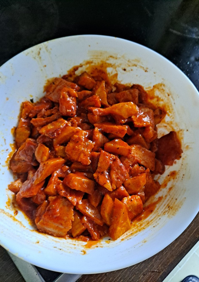 Una foto de Cinta de lomo con salsa de tomate