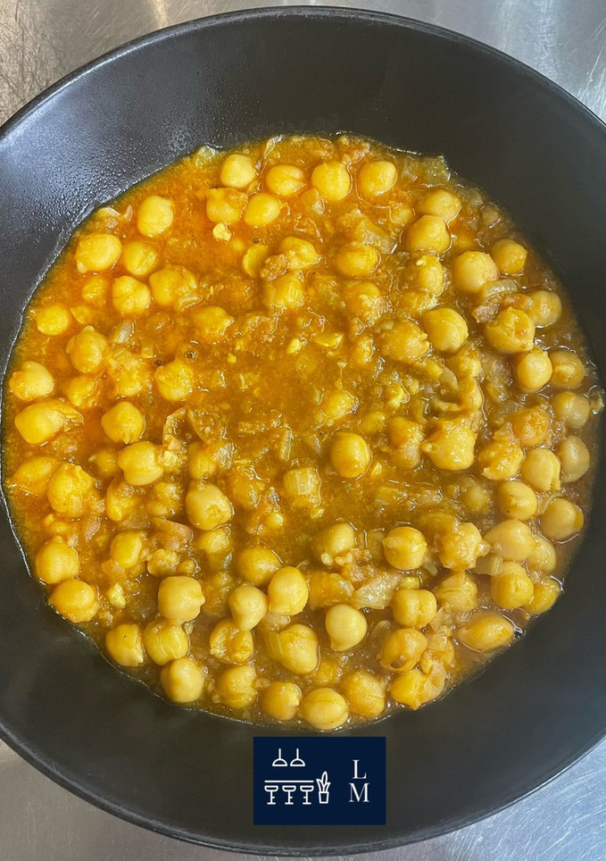Una foto de Garbanzos al curry en olla gm