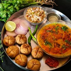 Rajsthani Dal Baati Churma thali (lunch or dinner) A picture of Rajsthani Dal Baati Churma thali (lunch or dinner).