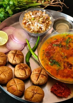 A picture of Rajsthani Dal Baati Churma thali (lunch or dinner).