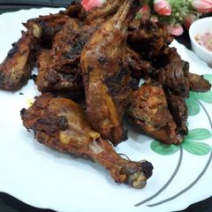 A picture of Roasted chicken leg tikka.