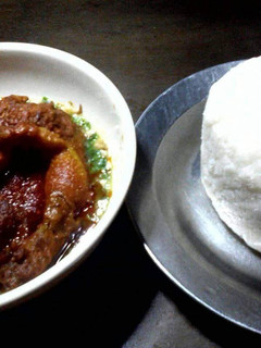 A picture of Okro with buka stew and poundo.