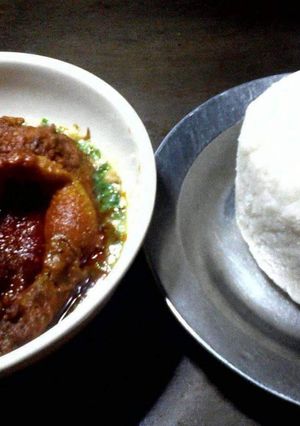A picture of Okro with buka stew and poundo.