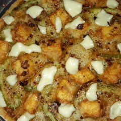 A picture of Butter Paneer pizza.