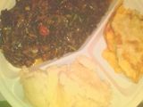 Ugali served with telele and flied egg