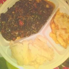 A picture of Ugali served with telele and flied egg.
