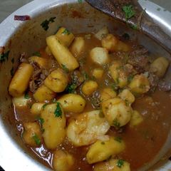 A picture of Matoke with beef stew.