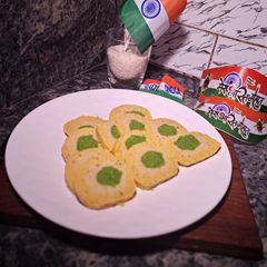 A picture of Kesariya tri-colour mawa roll.