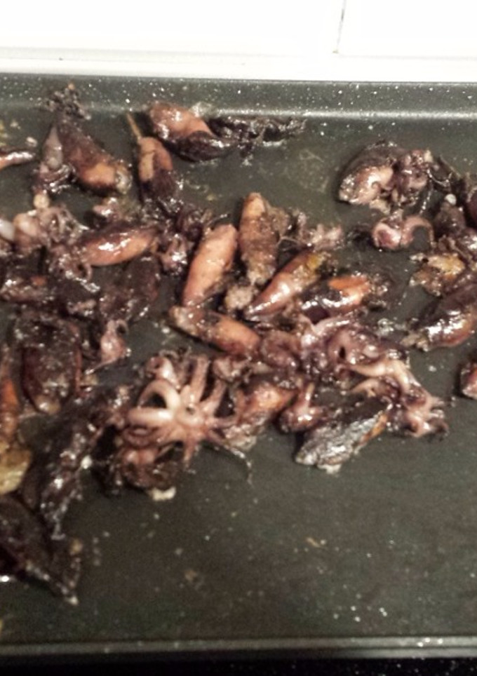 Una foto de Chipirones a la plancha con arroz
