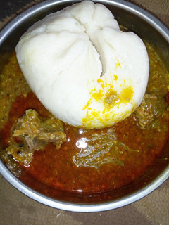 A picture of Semo with fried okro soup.