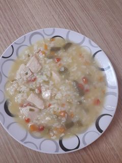 Una foto de Arroz con pollo a mi manera