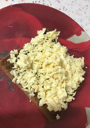 A picture of Nutella, honey, and cheese toast.