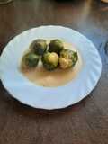 Coles de Bruselas en salsa de almendras