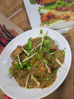 A picture of Haryali chicken karahi.