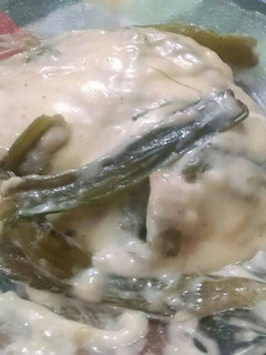 Una foto de Pencas de acelga con salsa blanca, jamón y queso cremoso