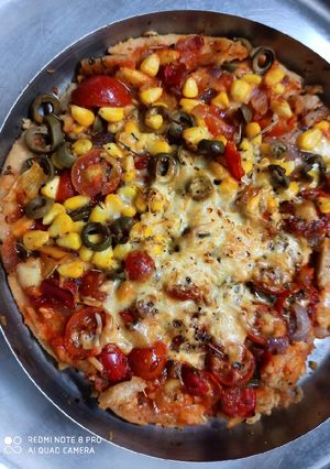 A picture of Bread Yummy wheat Pizza in Pan.