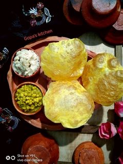 মিষ্টি কুমড়োর লুচি (Mishti kumdur luchi recipe in bengali) রেসিপির প্রধান ছবি