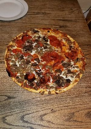 Una foto de Pizza Súper Supreme