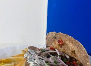 Una foto de Tacos o wrap integral y guarnición