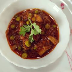 A picture of Mushroom Matar Masala.