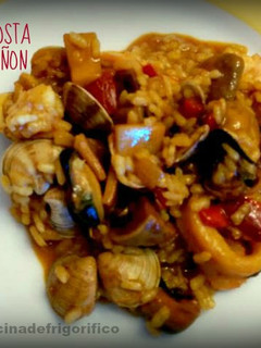Una foto de Arroz de costa con champiñon
