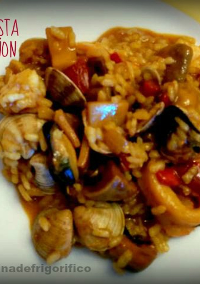 Una foto de Arroz de costa con champiñon
