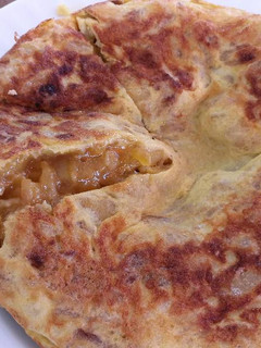 Una foto de Tortilla de Patatas & Cebolla