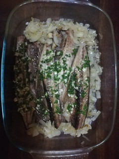 Una foto de Lomos de caballa al horno con limón y cebolla
