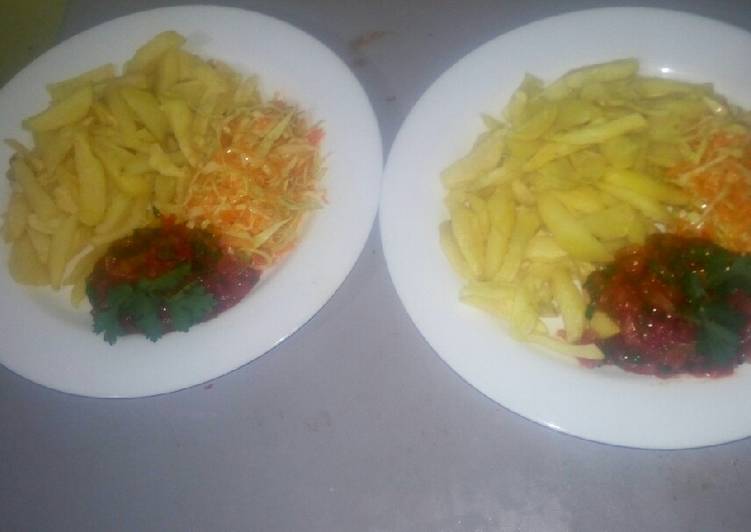 Oven baked fries,salad,tomato onion source