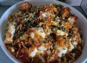 Une photo de 🍗🧀 Tasty crousty coquillettes façon restaurant