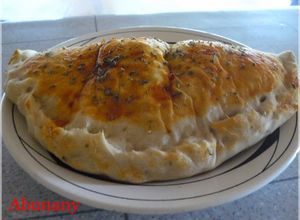 Foto principal de Calzone de jamón, queso y aceitunas