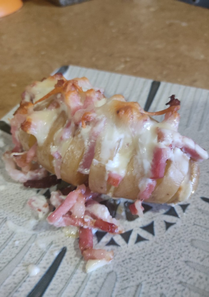 Una foto de Patatas rellenas de felicidad carbonara