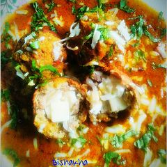 A picture of Cheese stuffed Raw Banana Koftas.