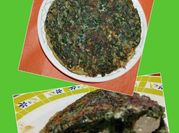 Una foto de pollo relleno con acelgas