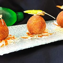 A picture of Dal chawal arancini.