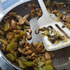 A picture of Swiss Chard and Mushroom Stir-fry with Spaghetti.