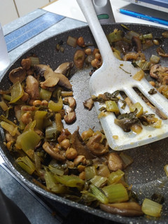 A picture of Swiss Chard and Mushroom Stir-fry with Spaghetti.