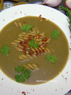 A picture of Onion Pasta Soup.