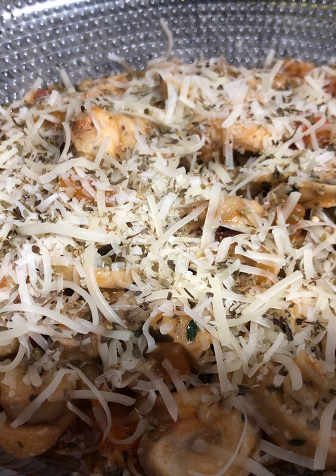 Una foto de Champiñones con tomate y queso