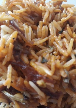 A picture of Chicken dum biryani in oven.