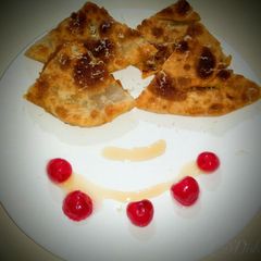 A picture of Paratha Stuffed With Raw Mango Chunda.