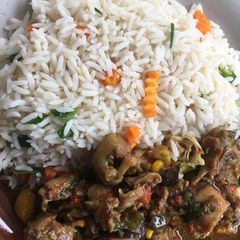 A picture of Chicken Bouillon sauce paired with white rice.
