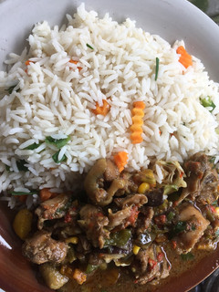 A picture of Chicken Bouillon sauce paired with white rice.