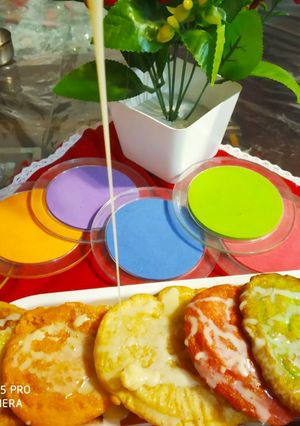 A picture of Multi colour Malpua.