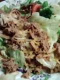 Cheese steak on lettuce bed