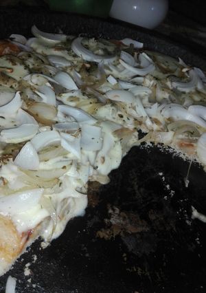 Una foto de Pizza fugazzeta o de cebolla