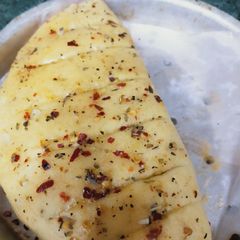 Garlic bread in a cooker A picture of Garlic bread in a cooker.