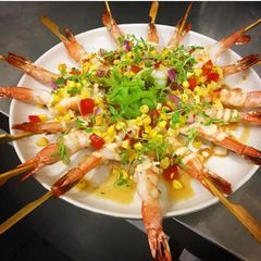 A picture of Prawns skewers with Lime and tequila corn salsa.