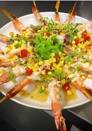 A picture of Prawns skewers with Lime and tequila corn salsa.